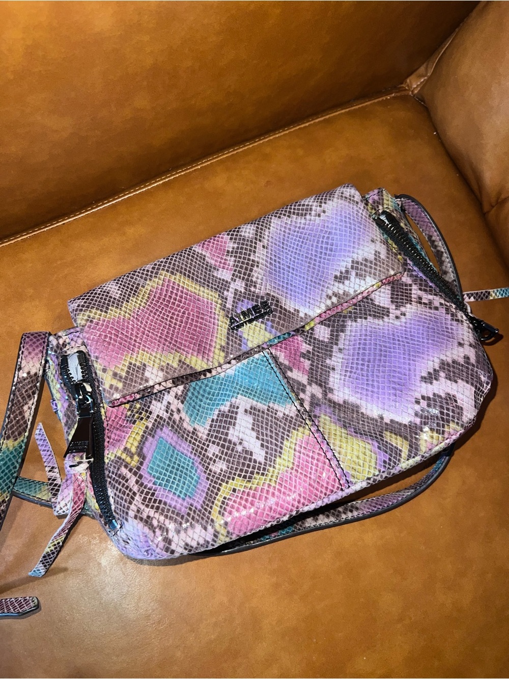 Aimee Kestenberg Bali 2 crossbody bag in a vibrant rainbow snakeskin print
